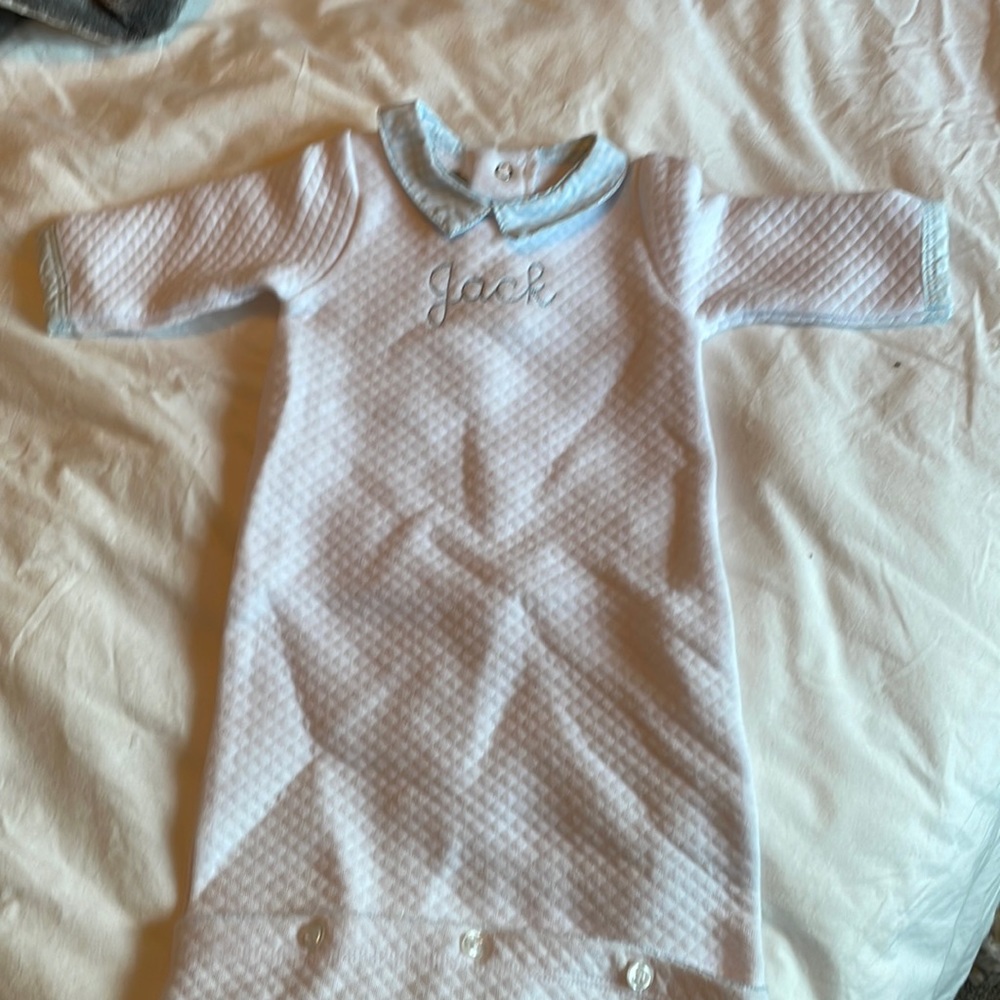 Newborn gown monogrammed with “jack”